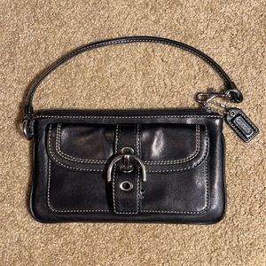 Leather Coach wristlet with zipper